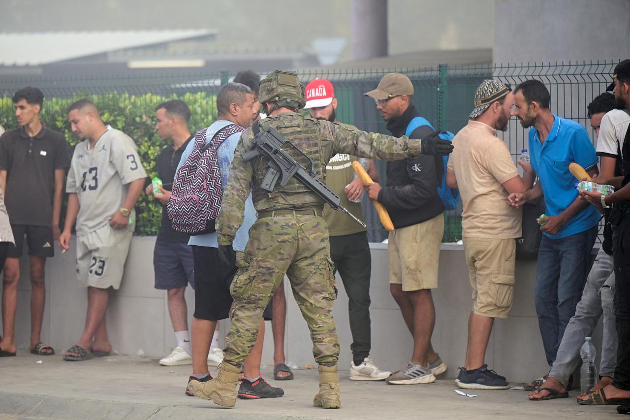 Mass crossings of migrants on foot and by sea from Morocco into Spanish territory, in Ceuta