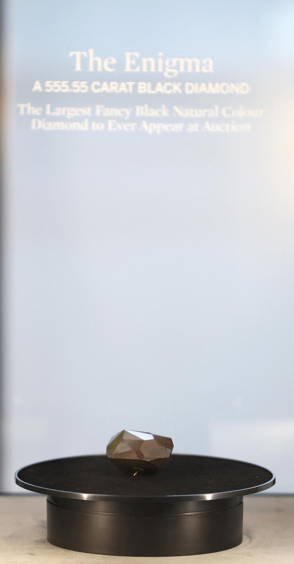 A 555.55 carat black diamond named The Enigma is pictured before being auctioned at Sotheby's in Beverly Hills