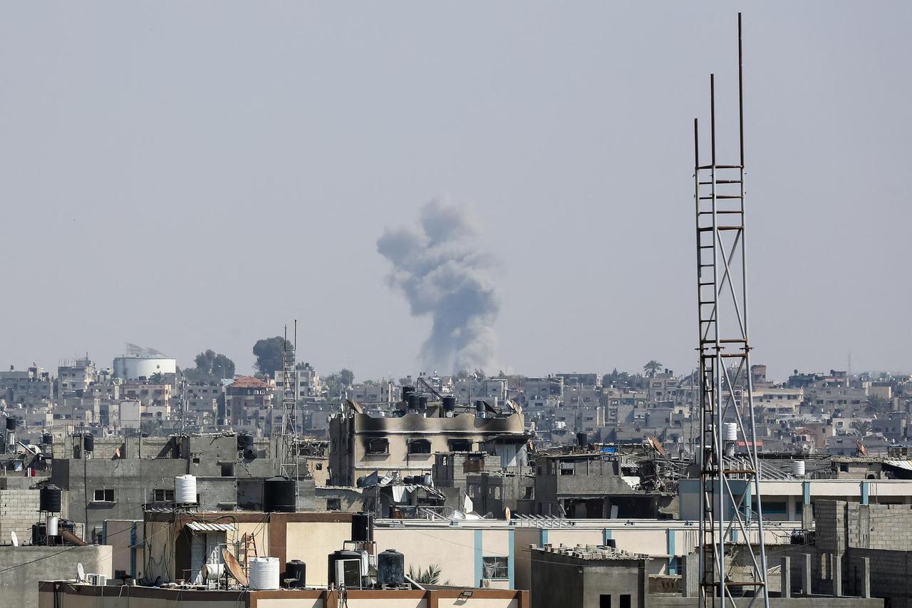 Smoke rises after an Israeli airstrike in Khan Younis