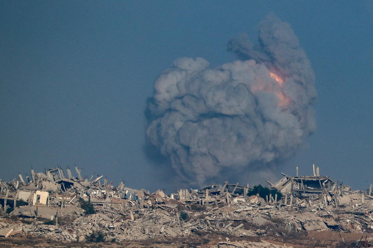 Smoke rises following an explosion in Gaza, as seen from Israel