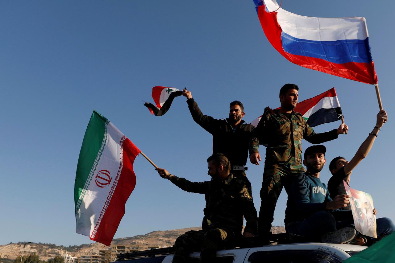 Vojske odane Basharu al-Assadu kažu da je rat u Siriji već završen, a vojnici slave s iranskim, sirijskim i ruskim zastavama