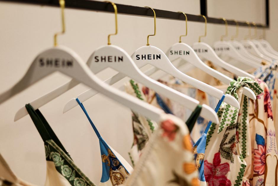 FILE PHOTO: Clothes from fast-fashion brand Shein hang at their office in Sao Paulo