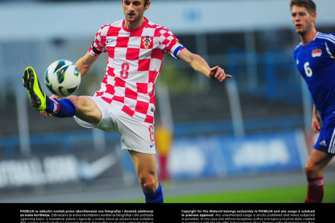 '10.10.2013., Stadion u Kranjcevicevoj, Zagreb - Kvalifikacijska utakmica za Europsko nogometno prvenstvo U-21 2015., skupina 5, Hrvatska - Lihtenstajn. Marcelo Brozovic, Samuel Zimmermann.  Photo: Da