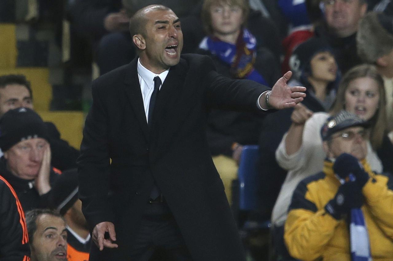 \'Chelsea manager Roberto Di Matteo reacts during their Champions League semi-final first leg against Barcelona at Stamford Bridge in London, April 18, 2012.  REUTERS/Eddie Keogh (BRITAIN - Tags: SPOR
