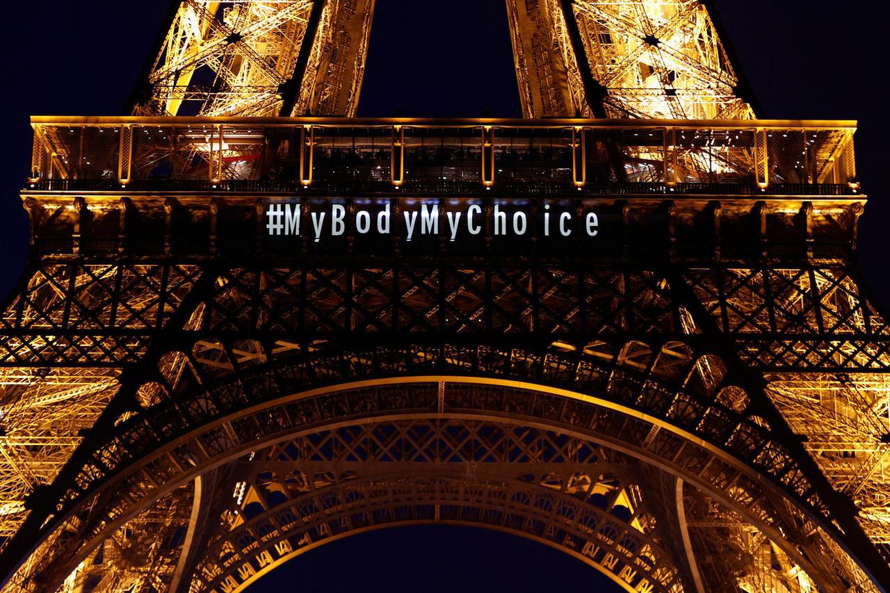 The Eiffel Tower lights up as abortion inscribed in France's constitution
