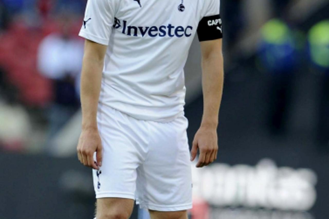 'Luka Modric of Tottenham Hotspur sticks his tongue out during the 2011 Vodacom Challenge final match between Orlando Pirates and Tottenham Hotspur at the Coca Cola Stadium on July 23, 2011 in Johanne
