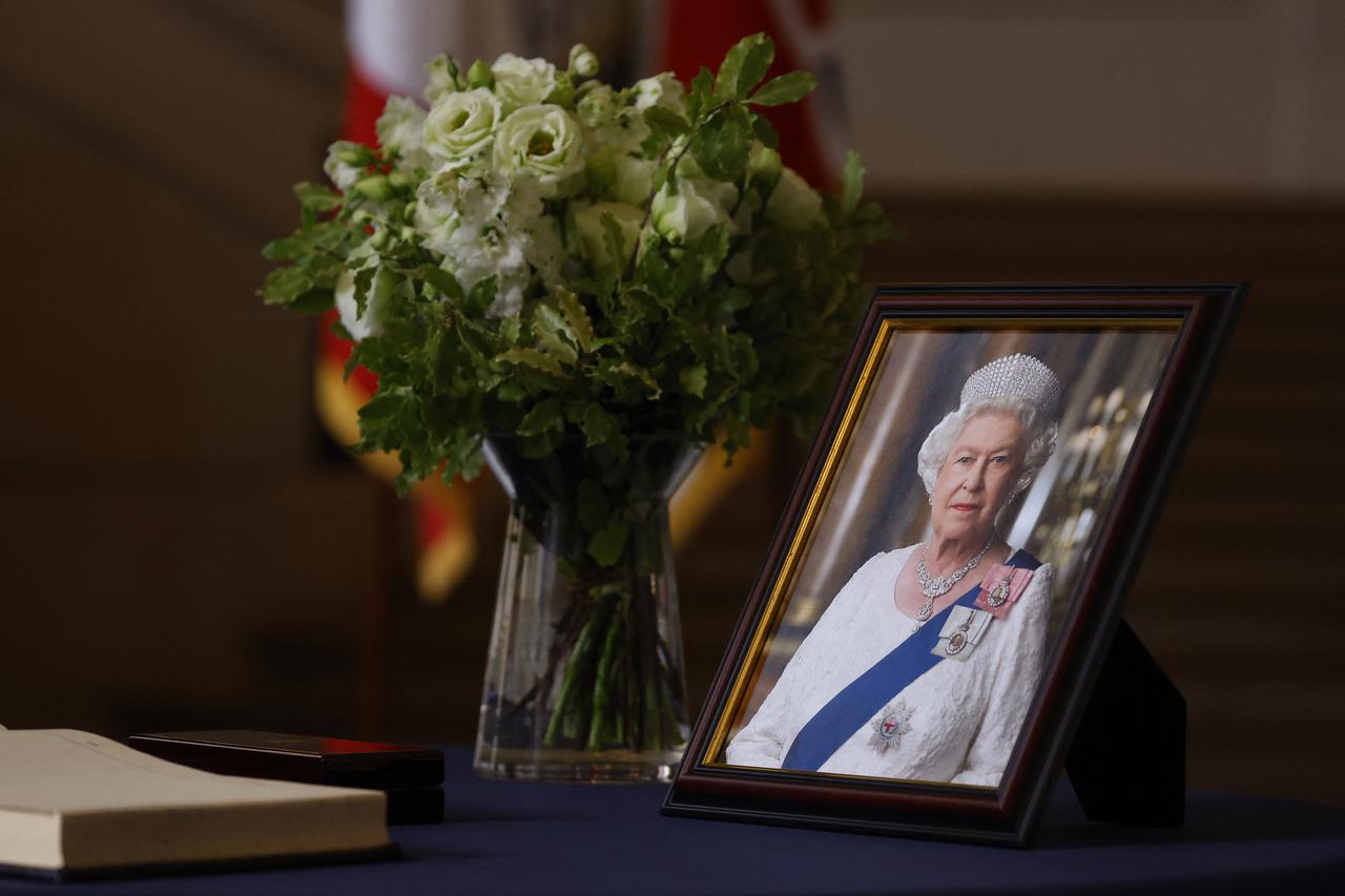 A portrait of Britain's Queen Elizabeth is displayed at the British Embassy in Paris