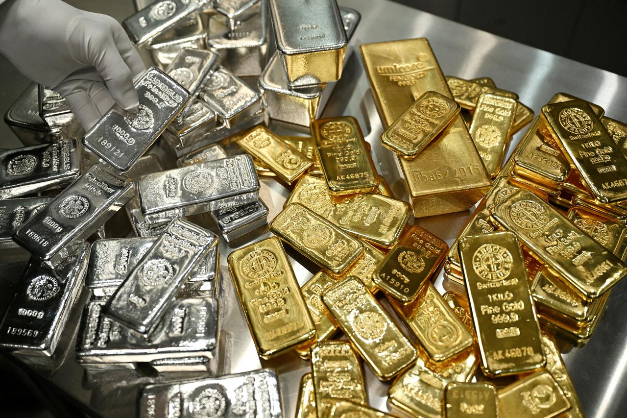 FILE PHOTO: Gold bars and coins in the safe