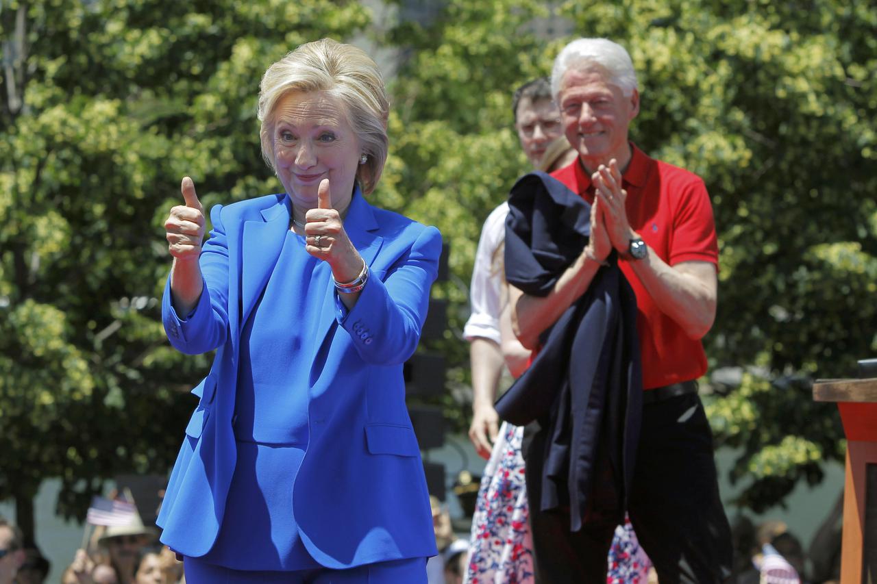 U.S. Democratic presidential candidate Hillary Clinton is joined onstage by her husband former President Bill Clinton after she delivered her 