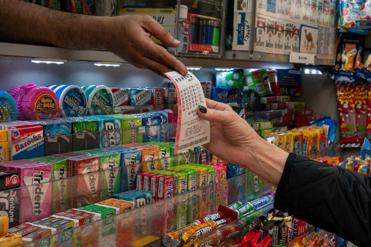 A digital billboard advertising Powerball Jackpot of 1.6 billion dollars is displayed in New York