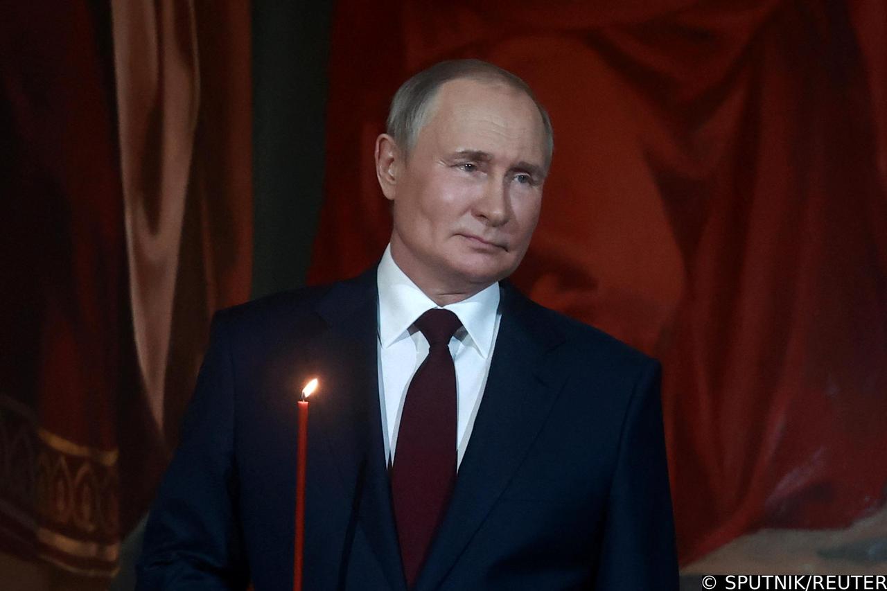 Russian President Vladimir Putin attends the Orthodox Easter service in Moscow