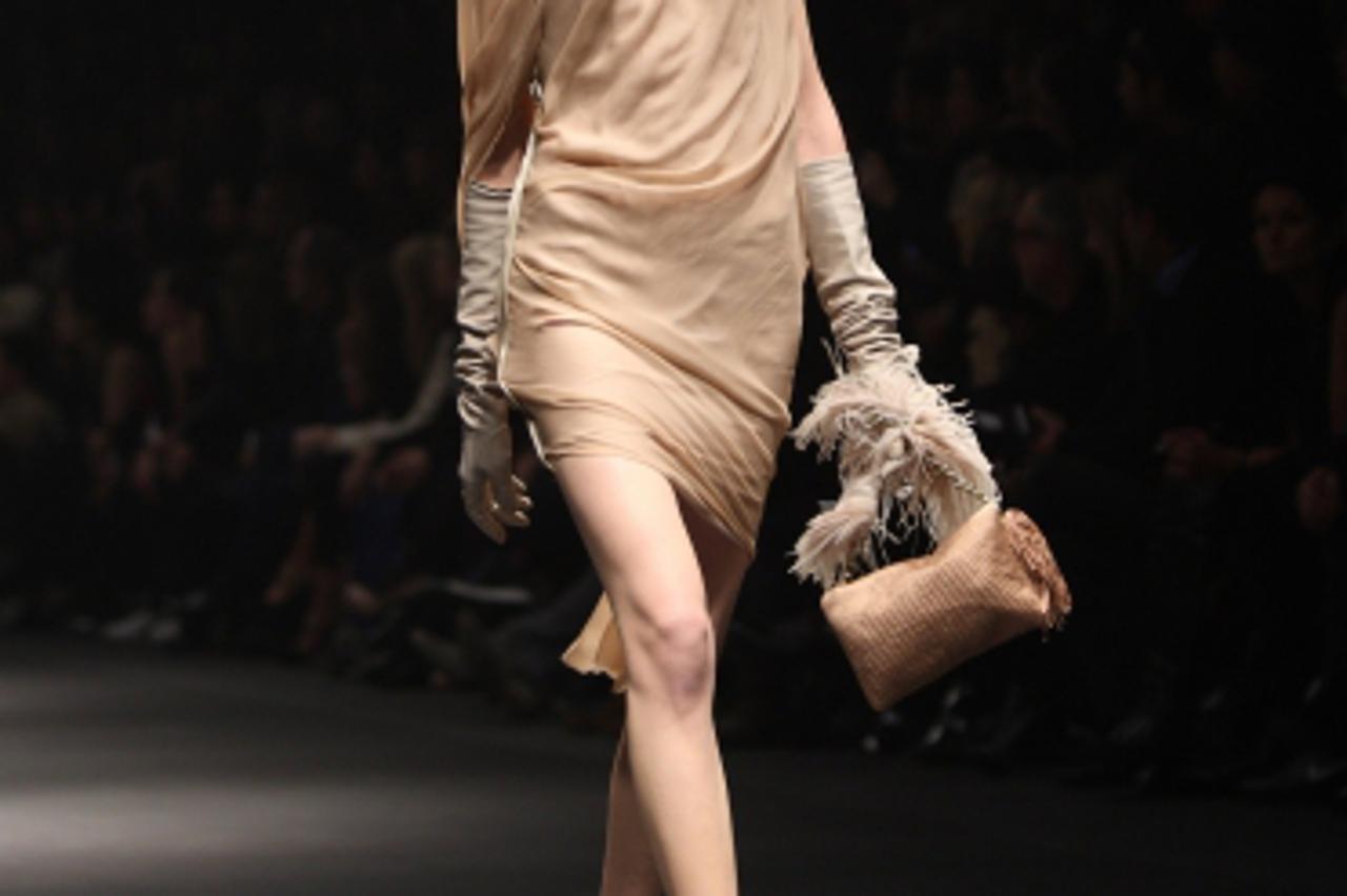'A model wears a creation as part of Lanvin Women\'s fashion fall winter 2010-2011 collection is presented during the Paris Pret-a-porter Women\'s Fashion Week in Paris, France, 05 March 2010. The Pre