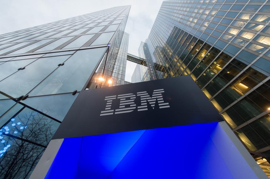 The logo of IBM is seen at the entrance to the Highlight Towers in?Munich,?Germany, 15 December 2015. Technology corporation IBM opens its worldwide headquarters for its 'Watson IoT' (Internet of Things) division inside the Highlight Towers. Artificial in