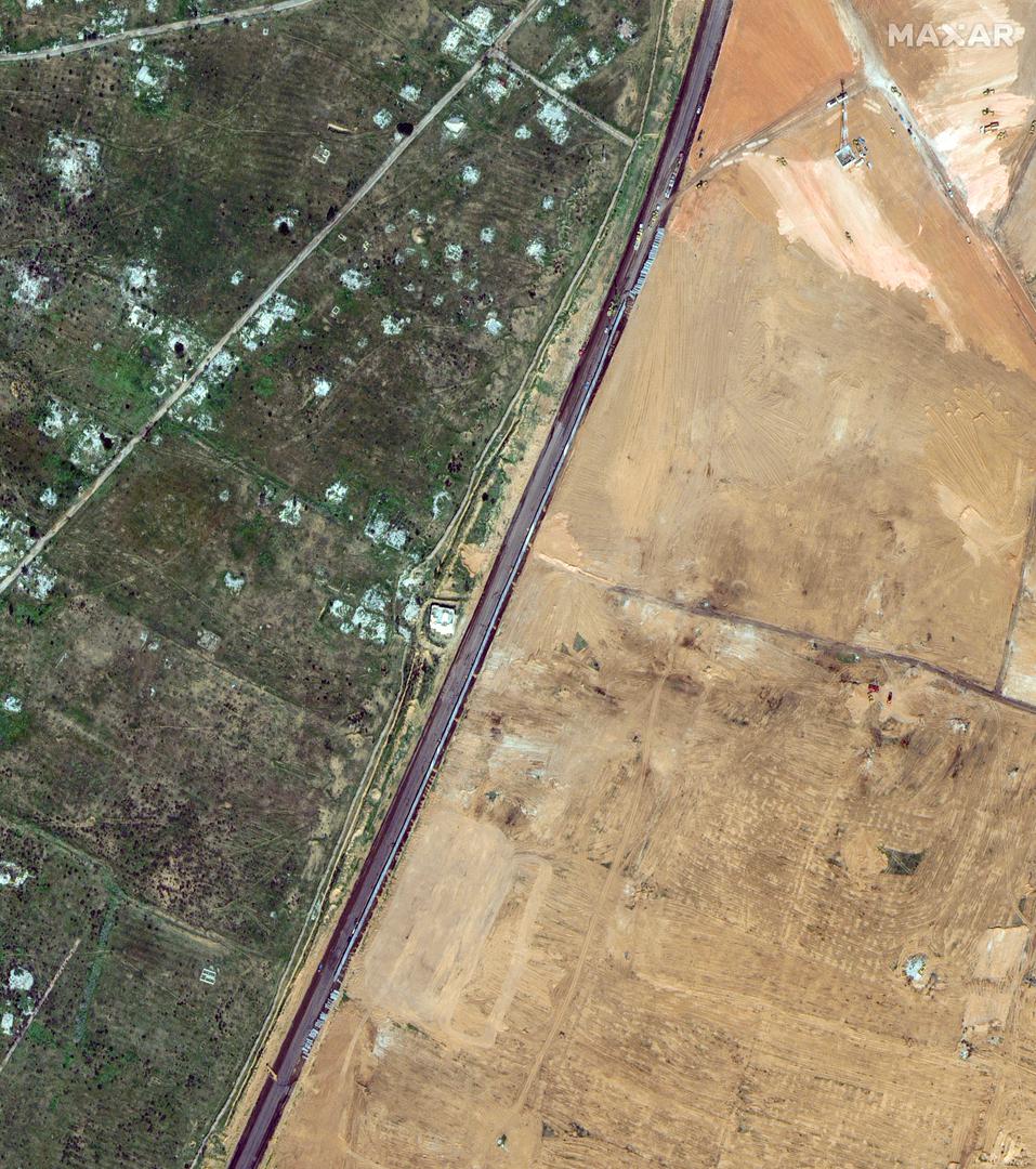 A satellite image shows the construction of a wall along the Egypt-Gaza border near Rafah, February 15, 2024. Maxar Technologies/Handout via REUTERS    THIS IMAGE HAS BEEN SUPPLIED BY A THIRD PARTY. NO RESALES. NO ARCHIVES. MANDATORY CREDIT. DO NOT OBSCURE LOGO. Photo: MAXAR TECHNOLOGIES/REUTERS