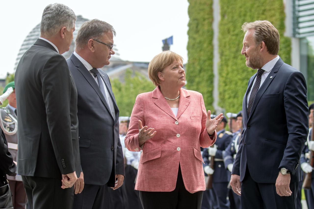 Članovi Predsjedništva BiH Dragan Čović, Mladen Ivanić i Bakir Izetbegović s njemačkom kancelarkom Angelom Merkel