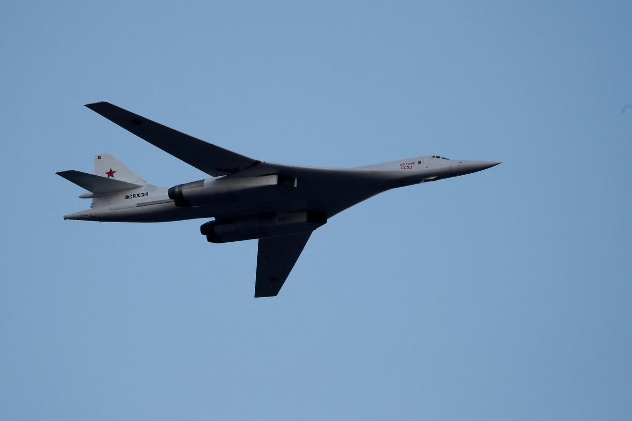 FILE PHOTO: Russian Tu-160 Supersonic Bomber flies during a military parade marking the Belarus Independence Day in Minsk