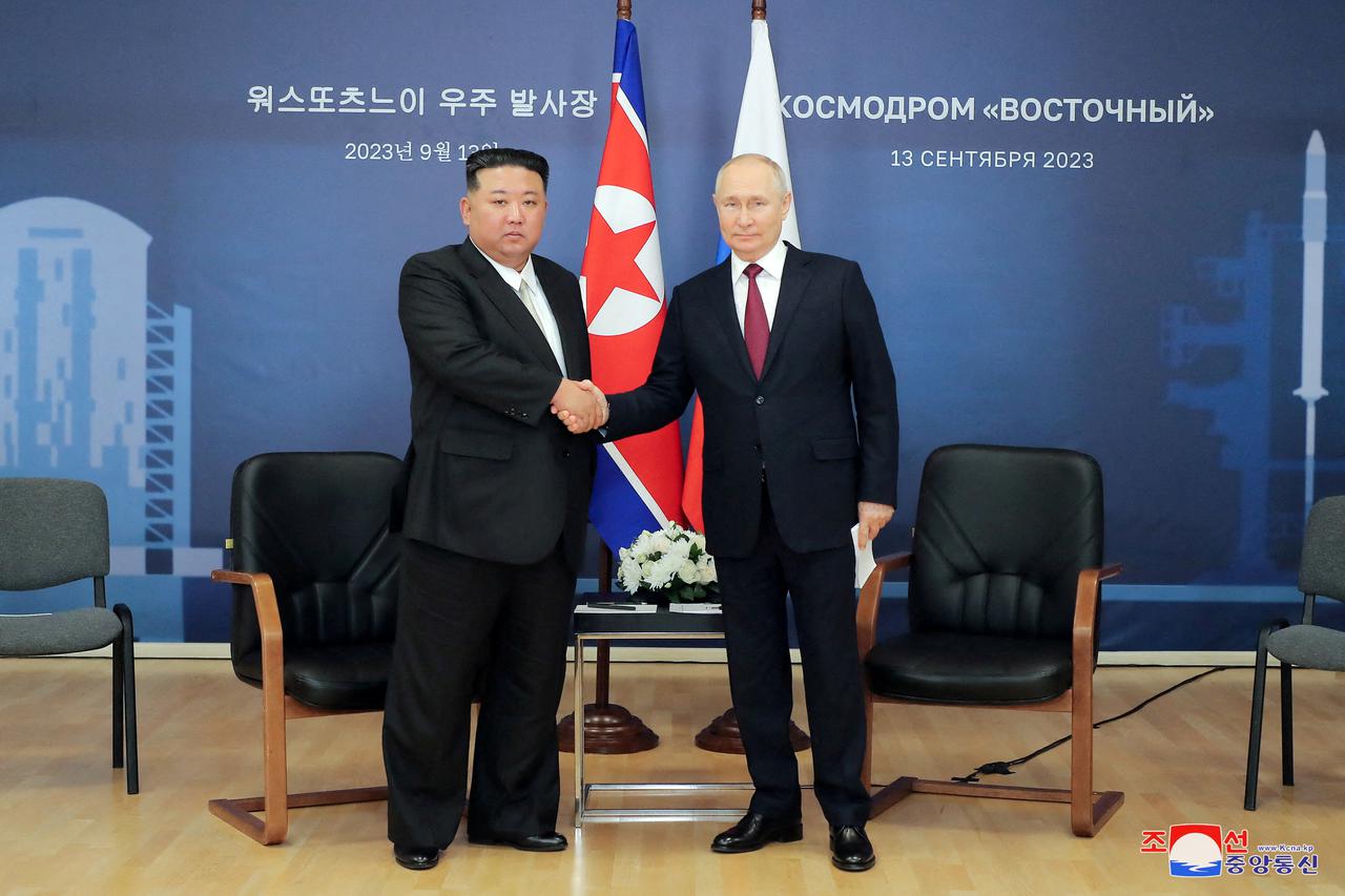 FILE PHOTO: Russia's President Putin and North Korea's leader Kim meet in Amur region