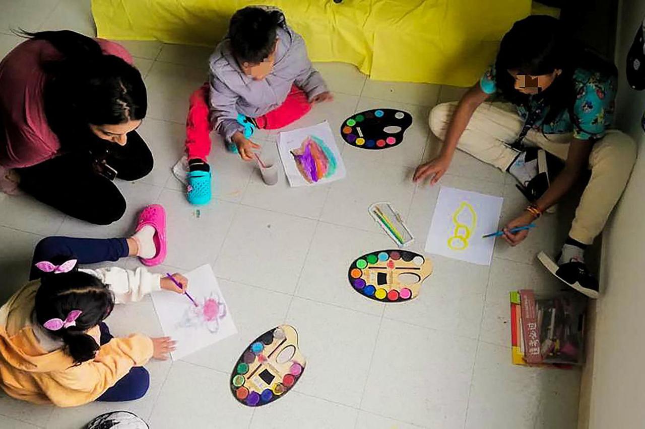 Children from a Cessna 206 plane that crashed in thick jungle play in a recovery center after being discharged from the Military Hospital in Bogota