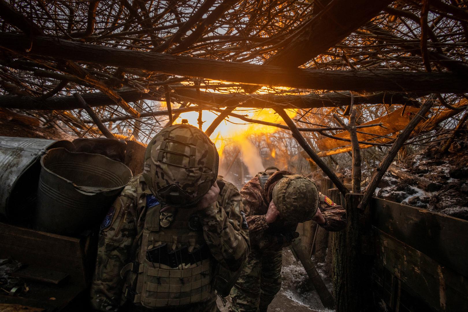Soldiers fire a mortar at a frontline position under the command of Odin, 32, a commander in the 28th Separate Mechanised Brigade, who lost his right lower leg in late 2022 during the liberation of Kherson, in the Donetsk region, amid Russia's attack on Ukraine, January 26, 2024. Odin, who is one of many amputees who decide to return to the battlefield, believes there is a need for an awareness campaign in Ukraine to help society grow more accustomed to combat amputees, understand the issues they face and appreciate the sacrifices they have made for the country. "Well, yes, we're in a war, but this is my comfort zone," he said. "I had offers to go back to my native Academy as a teacher or to work at a draft office in Odesa. I said I'm not interested in these positions because they wouldn't align ... with what I really want." REUTERS/Thomas Peter        SEARCH "THOMAS UKRAINE AMPUTEES" FOR THIS STORY. SEARCH "WIDER IMAGE" FOR ALL STORIES. Photo: Thomas Peter/REUTERS