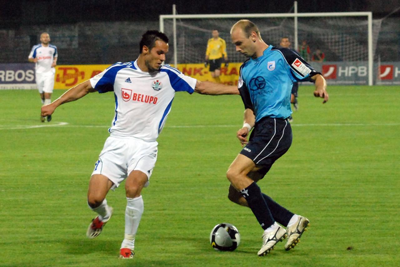 'Slavonija-Vinkovci-020809.-1 HNL. Cibalia-Slaven Belupo-7.Dino Kresinger,21.Mario Juric Photo: Goran Ferbezar /Vecernji'
