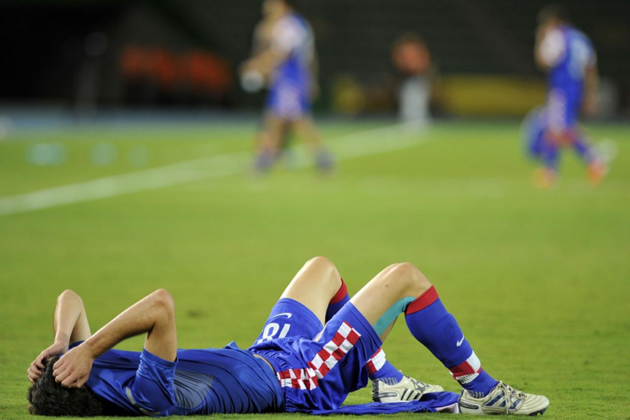 'Croatia player reacts at the end of their FIFA Under-20 World Cup football match against Guatemala played at Centenario in Armenia department Quindio Colombia, on August 6, 2011. AFP PHOTO / Aizar RA
