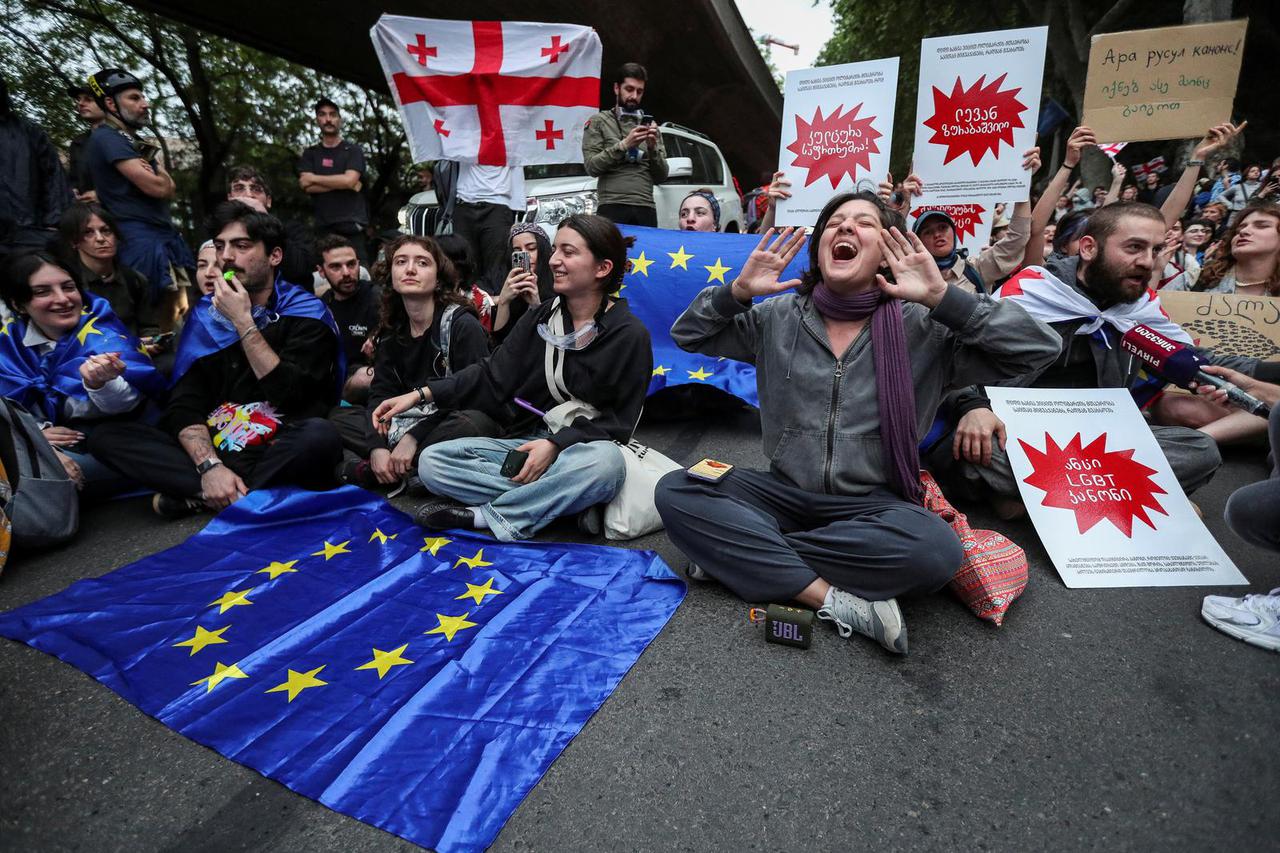Demonstrators hold a rally to protest against a bill on "foreign agents", in Tbilisi