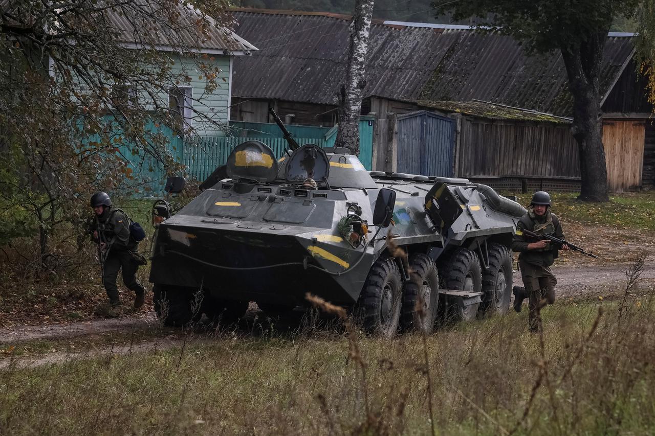 Ukrainian servicemen attend a joint drills at the border with Belarus