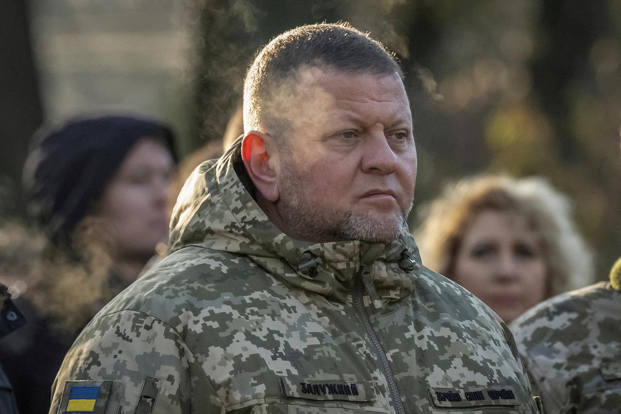 FILE PHOTO: Chief of the Ukrainian Armed Forces Zaluzhnyi visits a monument to Holodomor victims in Kyiv