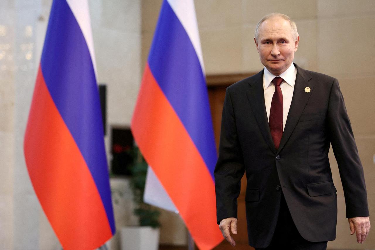 Russian President Putin attends a news conference in Bishkek
