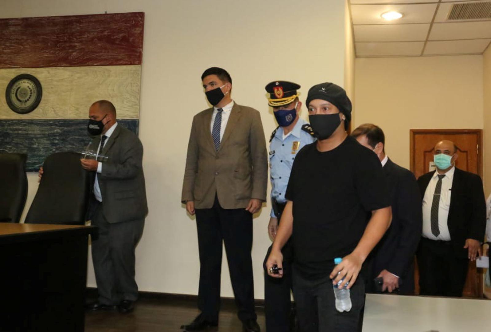 Ronaldinho is seen arriving at the hearing at the Supreme Court of Justice where he could be released from the home prison he has been holding for 4 months in a hotel in Asuncion Ronaldinho is seen arriving at the hearing at the Supreme Court of Justice where he could be released from the home prison he has been holding for 4 months in a hotel in Asuncion, Paraguay, August 24, 2020. Sebastian Caceres/Paraguayan Supreme Court/Handout via REUTERS  ATTENTION EDITORS - NO RESALES. NO ARCHIVES. THIS IMAGE HAS BEEN SUPPLIED BY A THIRD PARTY. HANDOUT