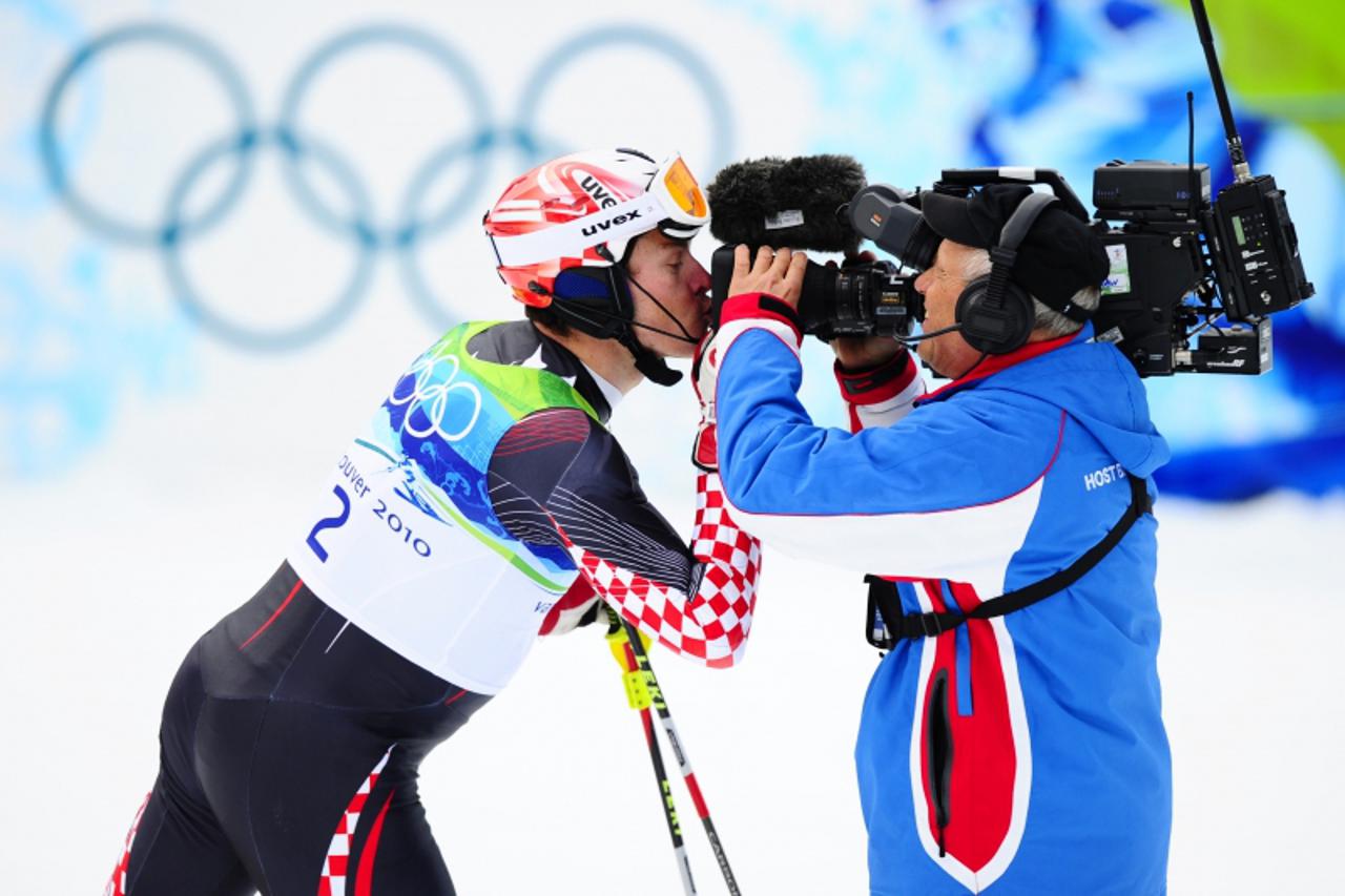 'Croatia\'s Ivica Kostelic kisses the camera in the finish area during the Men\'s Vancouver 2010 Winter Olympics Slalom event at Whistler Creek side Alpine skiing venue on February 27, 2010.   AFP PHO