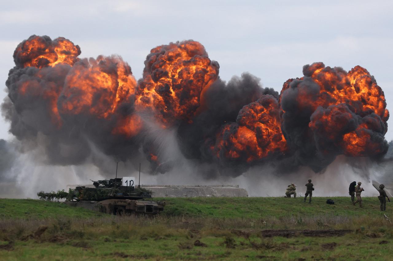 Polish forces with NATO soldiers hold military exercises 'Iron Defender' at Orzysz training ground in Wierzbiny