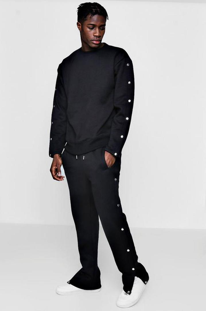 Hlače s gumbima duž nogavica koje se lako otkopčaju, a hlače u trenu postaju odjevni komad u kojima se mnogi osjećaju udobno

