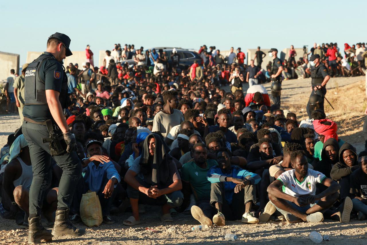 Mass crossings of migrants on foot and by sea from Morocco into Spanish territory, in Ceuta
