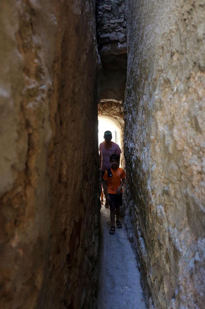 14.07.2020., Vrbnik - Turisticka patrola. Najuza ulica u Vrbniku.
Photo: Goran Kovacic/PIXSELL