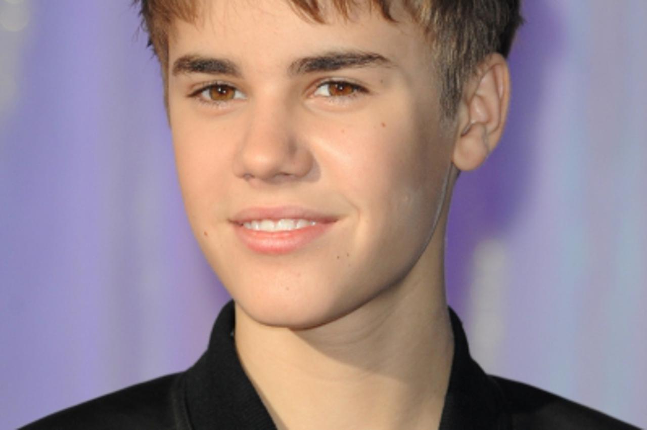 'Justin Bieber unveils his new waxwork at Madame Tussauds, London. Photo: Press Association/Pixsell'