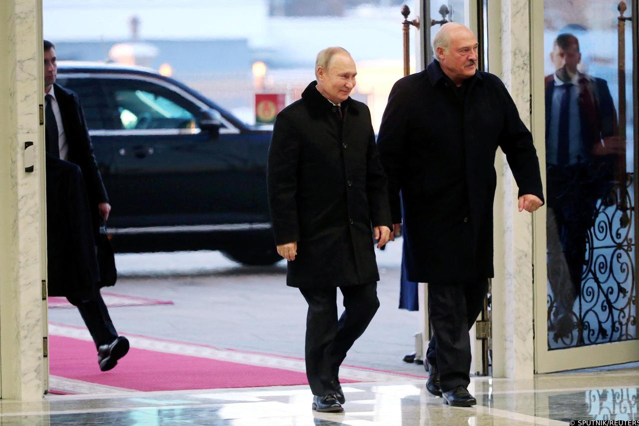 Russian President Vladimir Putin and Belarusian President Alexander Lukashenko arrive for meeting in Minsk