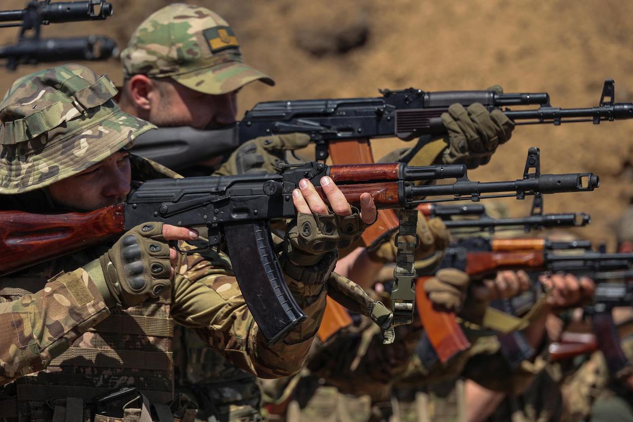 Recruits of the Offensive Guard assault brigade attend a combat training in Kharkiv