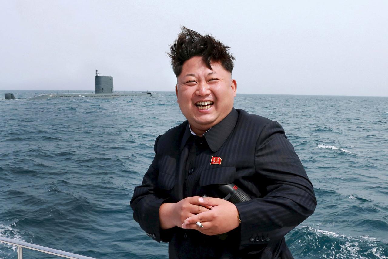 North Korean leader Kim Jong Un watches the test-fire of a strategic submarine underwater ballistic missile (not pictured), in this undated file photo released by North Korea's Korean Central News Agency (KCNA) in Pyongyang on May 9, 2015. North Korea sai