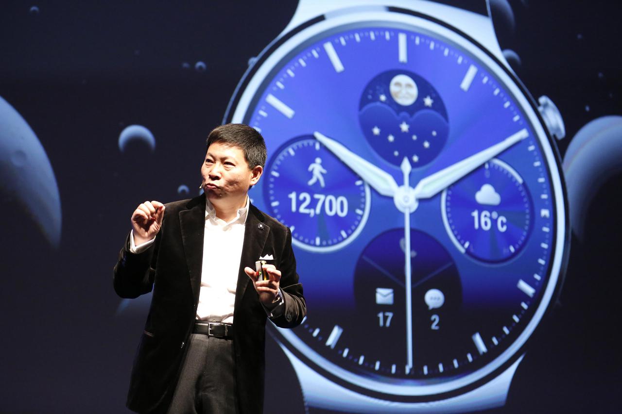 Huawei Chief Executive Richard Yu presents the Huawei Watch during a news conference in Barcelona March 1, 2015. Chinese telecom equipment maker Huawei on Sunday launched its first smartwatch, a round-faced device that works with Android phones, joining a