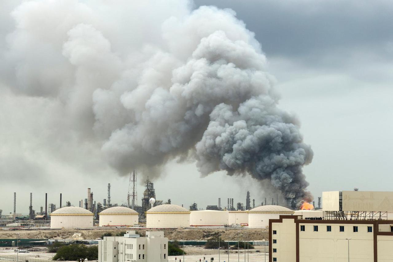Smoke rises following a strike in Manama