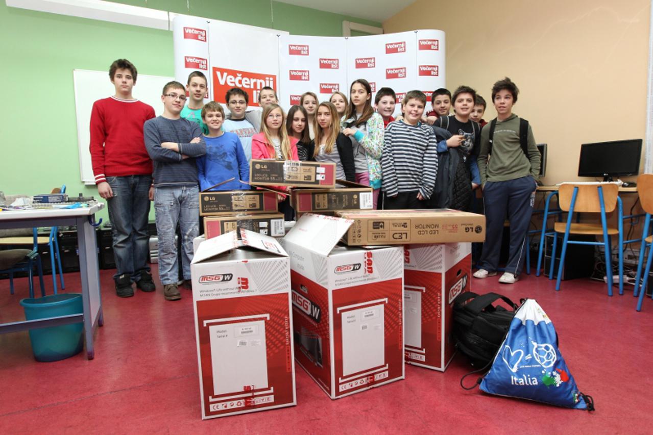 '09.04.2013.Zagreb-Vecernji list je donirao 12 racunala osnovnoj skoli Ivan Cankar na crnomercu. Photo: Boris Scitar/VLM'