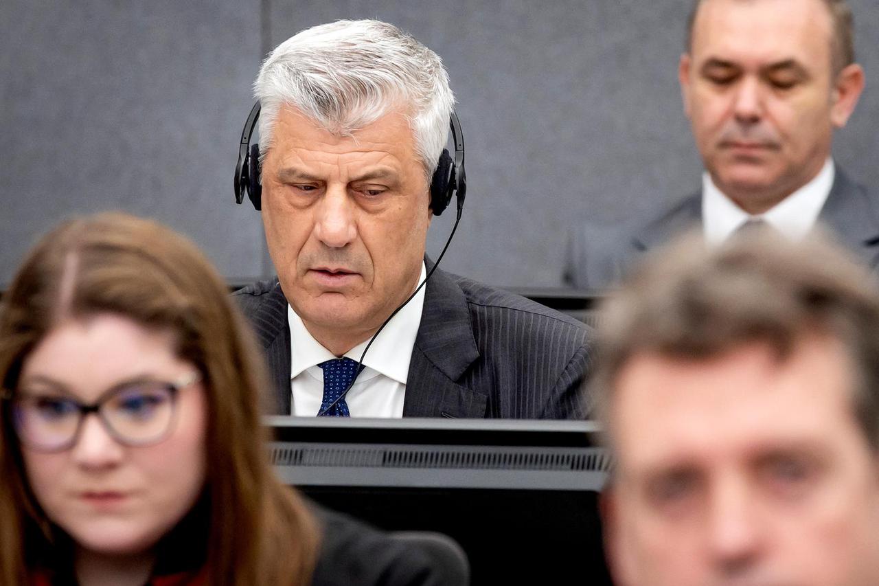 Former Kosovo President Hashim Thaci attends his war crimes trial in The Hague