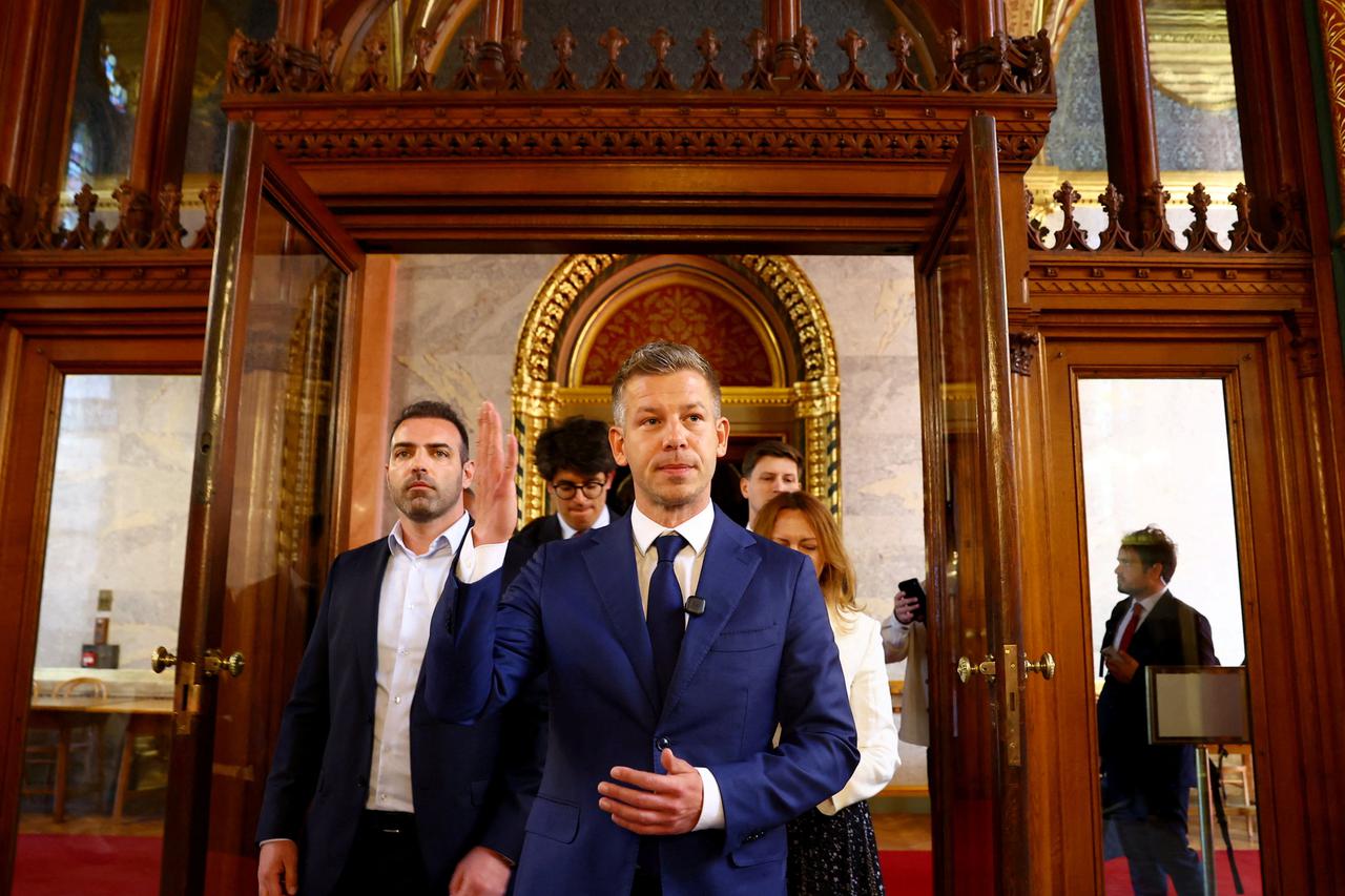 Hungary's election winner Magyar arrives to the media after talks between parties on preparations for the first session of the Parliament in Budapest