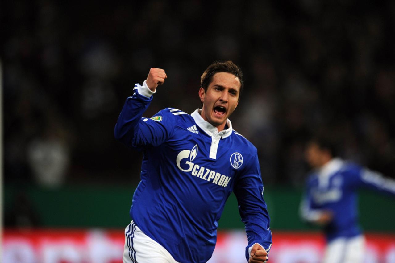 'Schalke\'s Croatian striker Mario Gavranovic celebrates after scoring the 1-1 during the German Cup quarter-final football match of FC Schalke 04 against 1. FC Nuremberg on January 25, 2011 in Gelsen