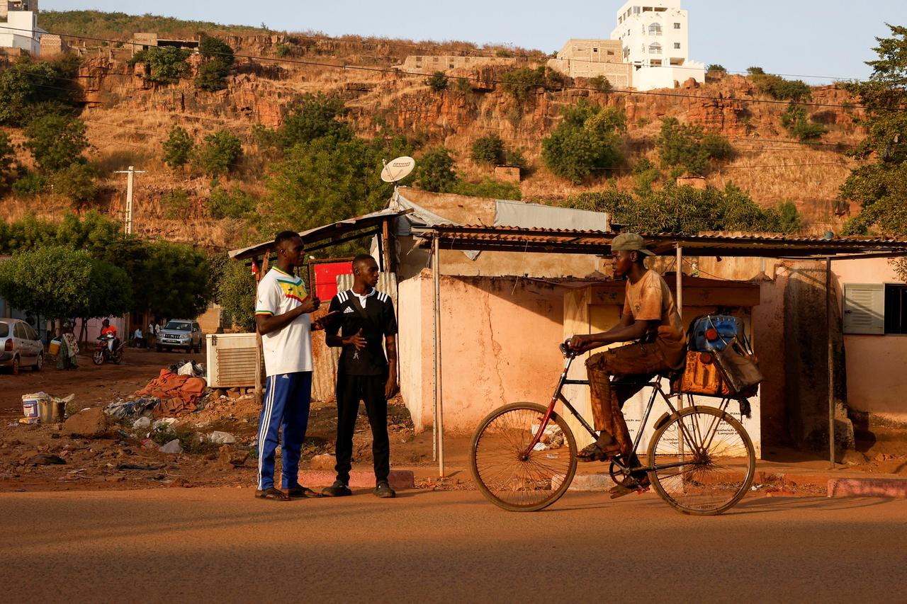 The Wider Image: From France to Mali, a deportee's struggle far from home