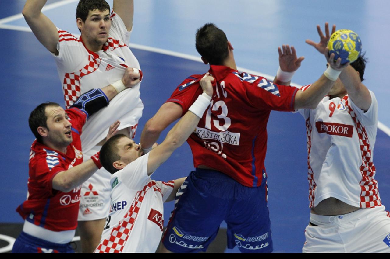 \'19.01.2011., Malmo, Svedska - Svjetsko prvenstvo u rukometu, utakmica skupine C, Hrvatska - Srbija.Jakov Gojun, Drago Vukovic. Photo: Antonio Bronic/PIXSELL\'