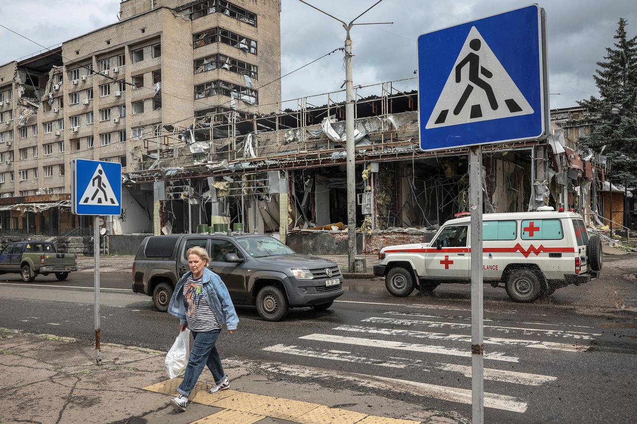 People walk through streets of Kramatorsk