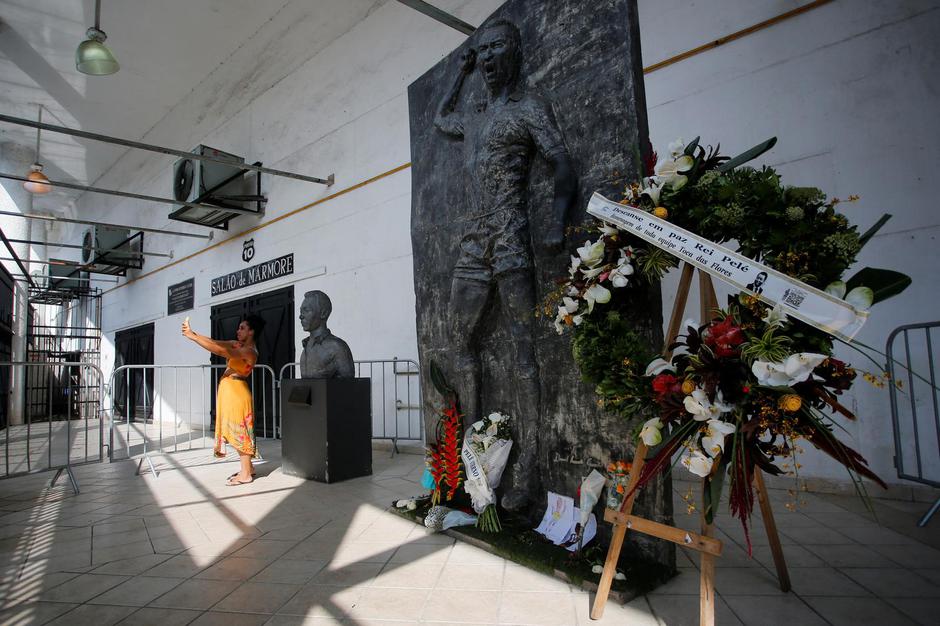 Fans around the Vila Belmiro stadium on the eve of Pele's funeral, in Santos