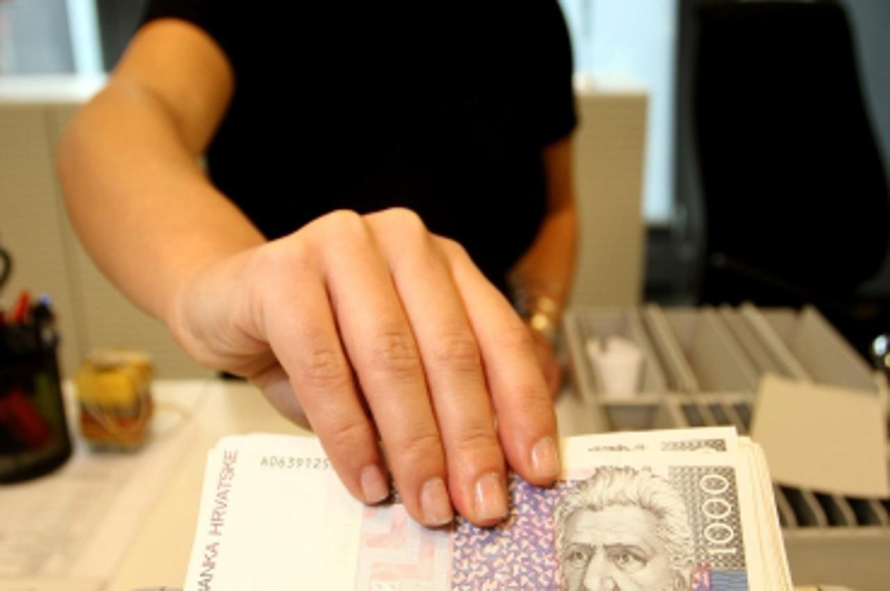 '22.12.2008., Zagreb - Erste Banka. Snimanje ilustracije - koristenje usluga banke i komunikacija s osobnim bankarom. Photo: Davor Puklavec/24sata'